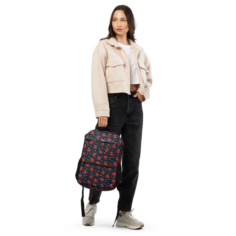 Model carrying a Cosmic Duck all-over pattern utility backpack