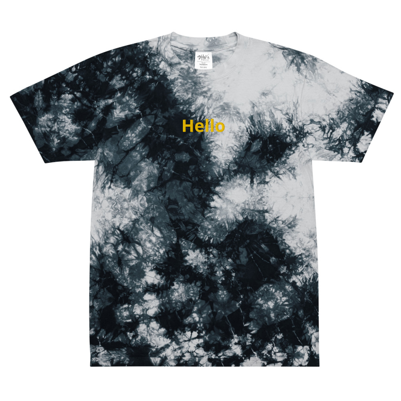 Black and white tie-dye oversized tee with yellow "Hello" embroidered on the chest