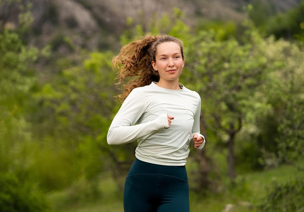 A woman running in sportswear.