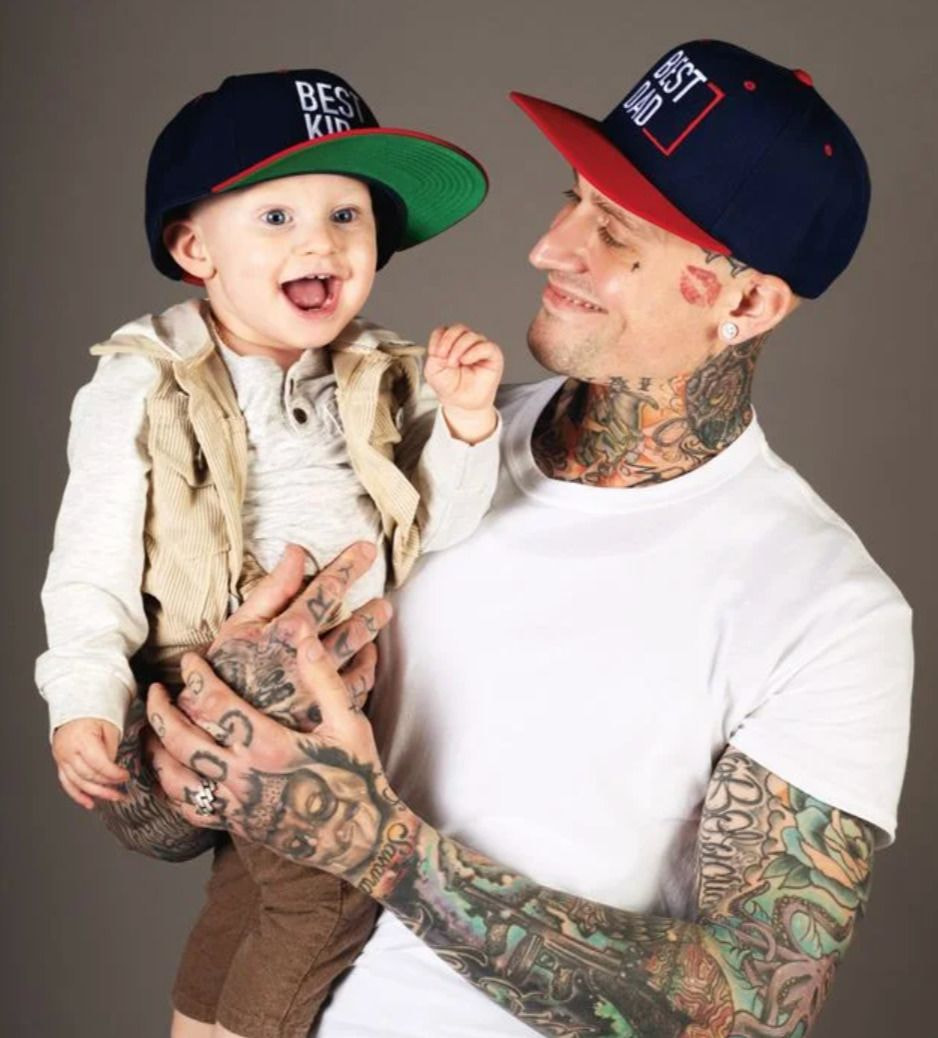 a man holding a baby