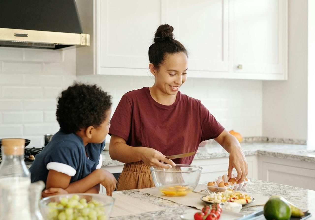 A woman cooking.