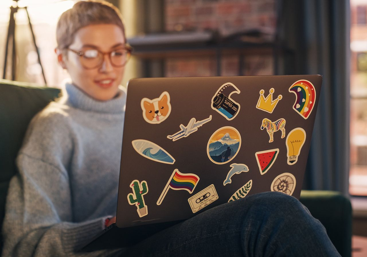 A woman is working on her laptop