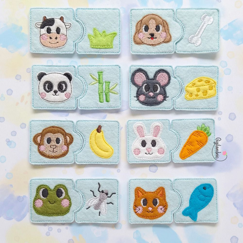 A collection of colorful felt animals displayed on a vibrant blue background.