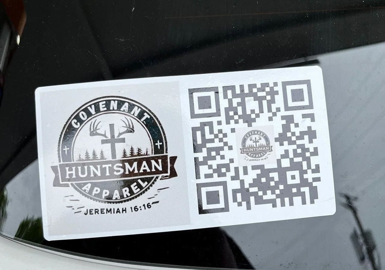 Sticker on a car window featuring a "Covenant Huntsman Apparel" logo with antlers and a cross. Includes a QR code and reference to Jeremiah 16:16.
