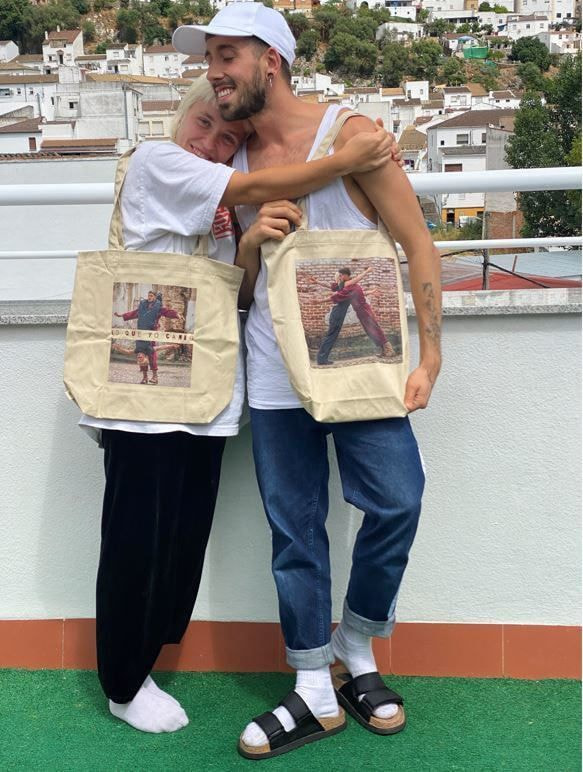 Young people with custom tote bags