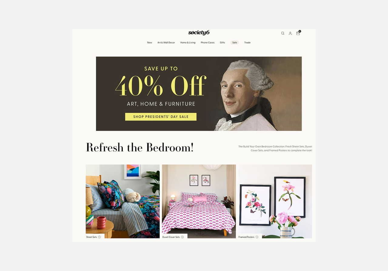 A screenshot mockup of Society6’s homepage hero section as an example of a Zazzle alternative.