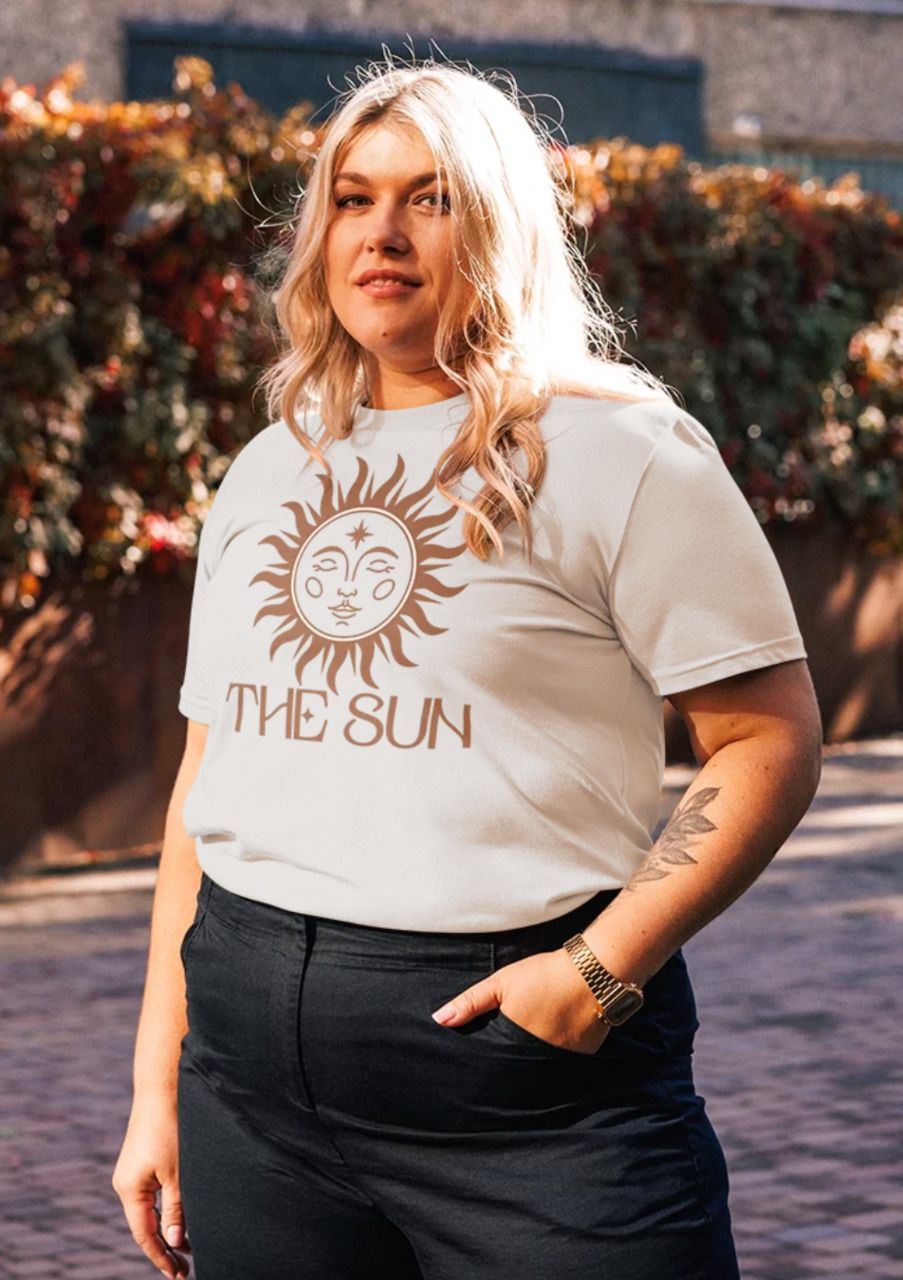 a woman standing outside with her hand in her pocket