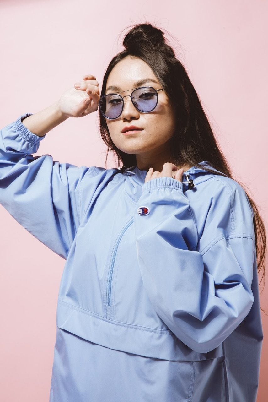 girl wearing champion embroidered jacket