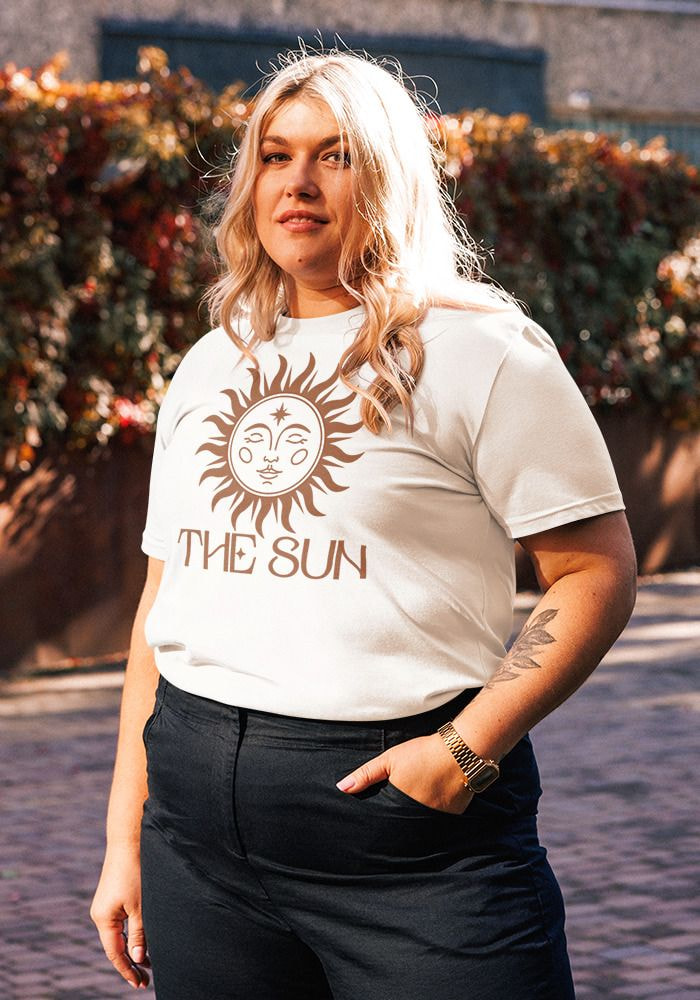 a woman standing outside with her hand in her pocket