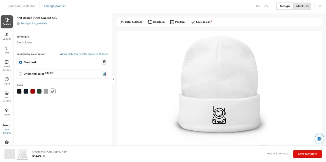 a white beanie with a cartoon character on it