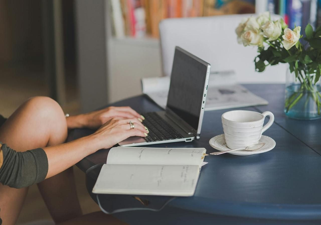 A person typing on a computer.