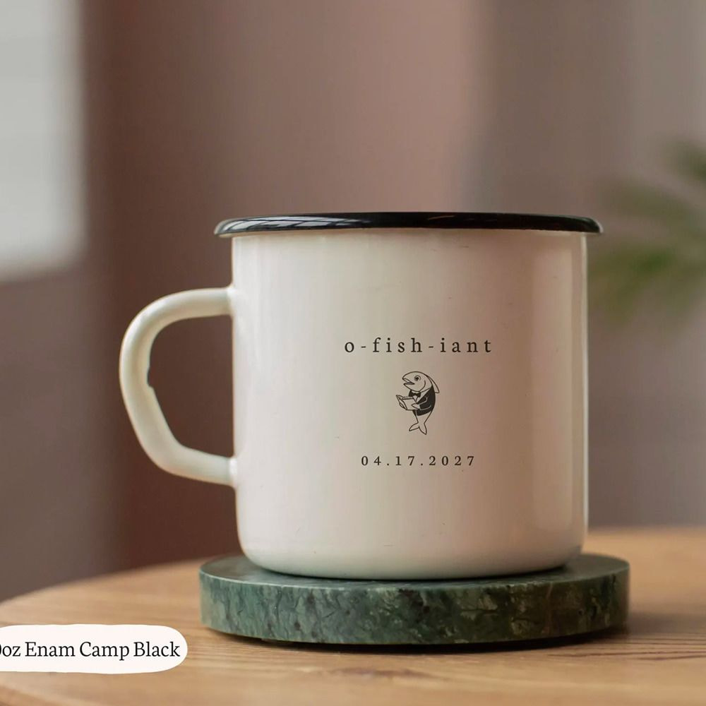 a white mug with a black rim
