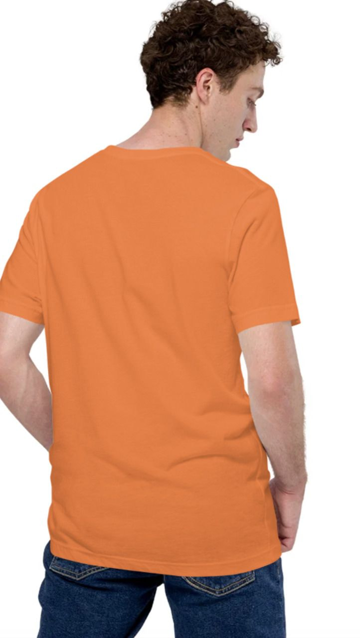 a man in an orange shirt