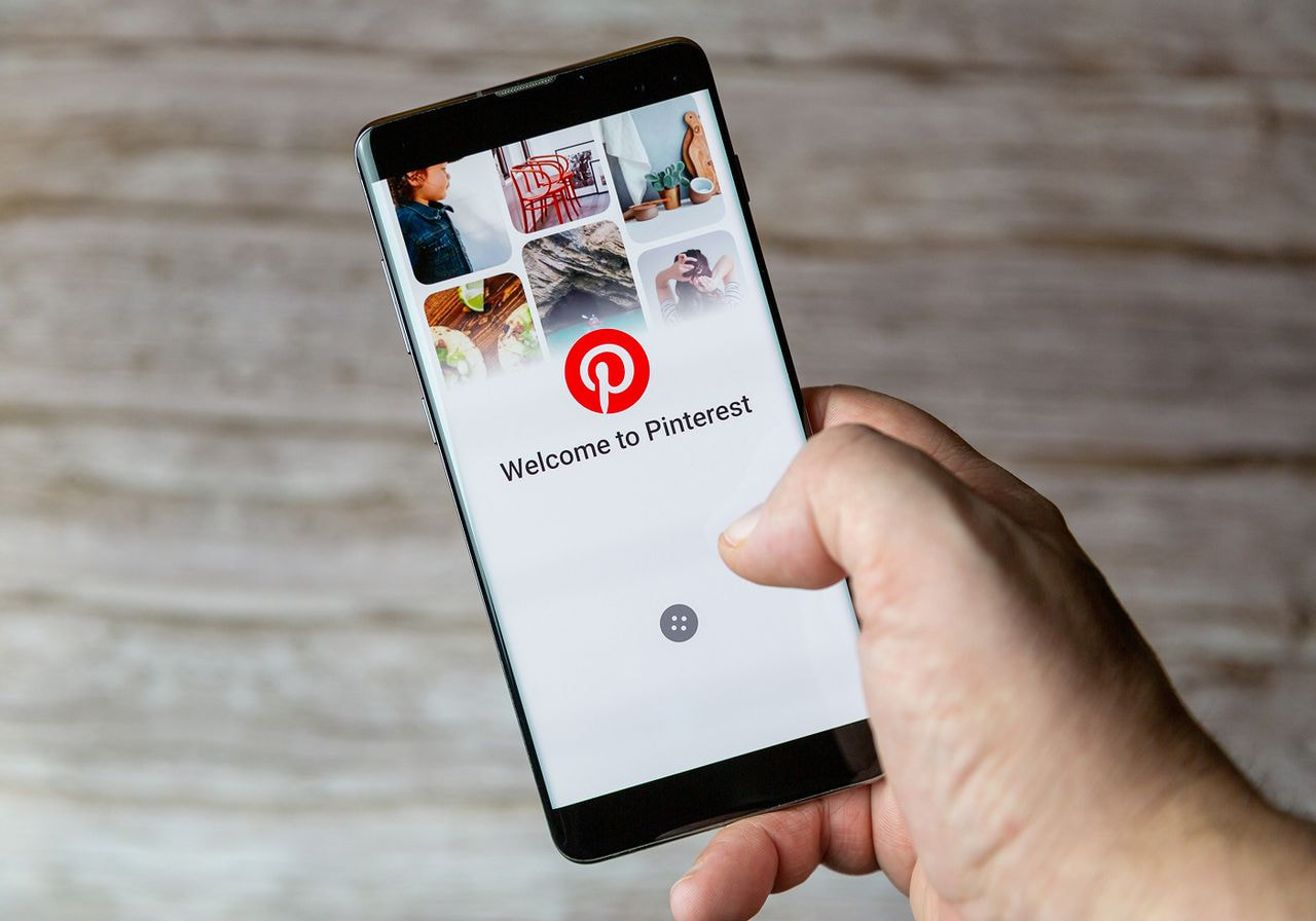 A Person is opening the Pinterest app.
