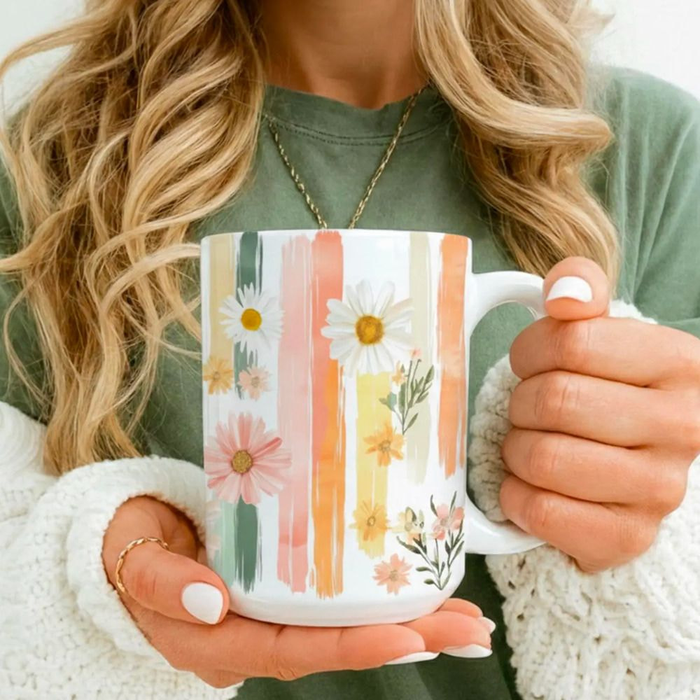 a woman holding a mug