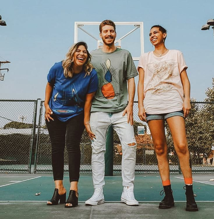 Young people wearing custom t-shirts