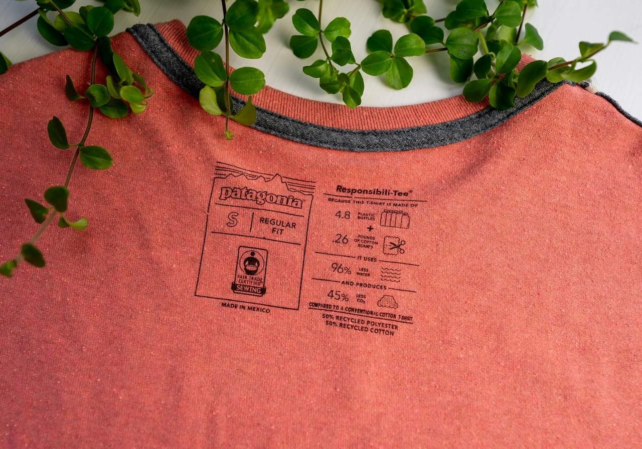 A shirt featuring a label that reads "organic," indicating its environmentally friendly material.