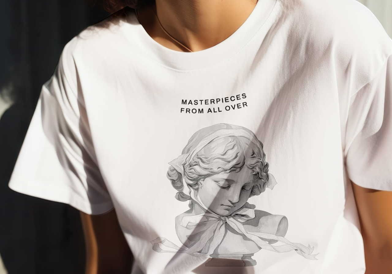 A person wearing a white t-shirt with a grayscale Renaissance-style female bust. The text reads "Masterpieces from all over".