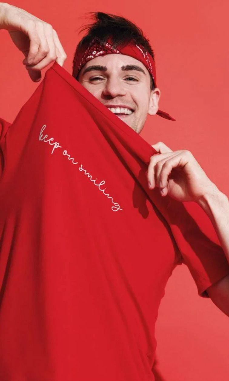 a man in a red shirt