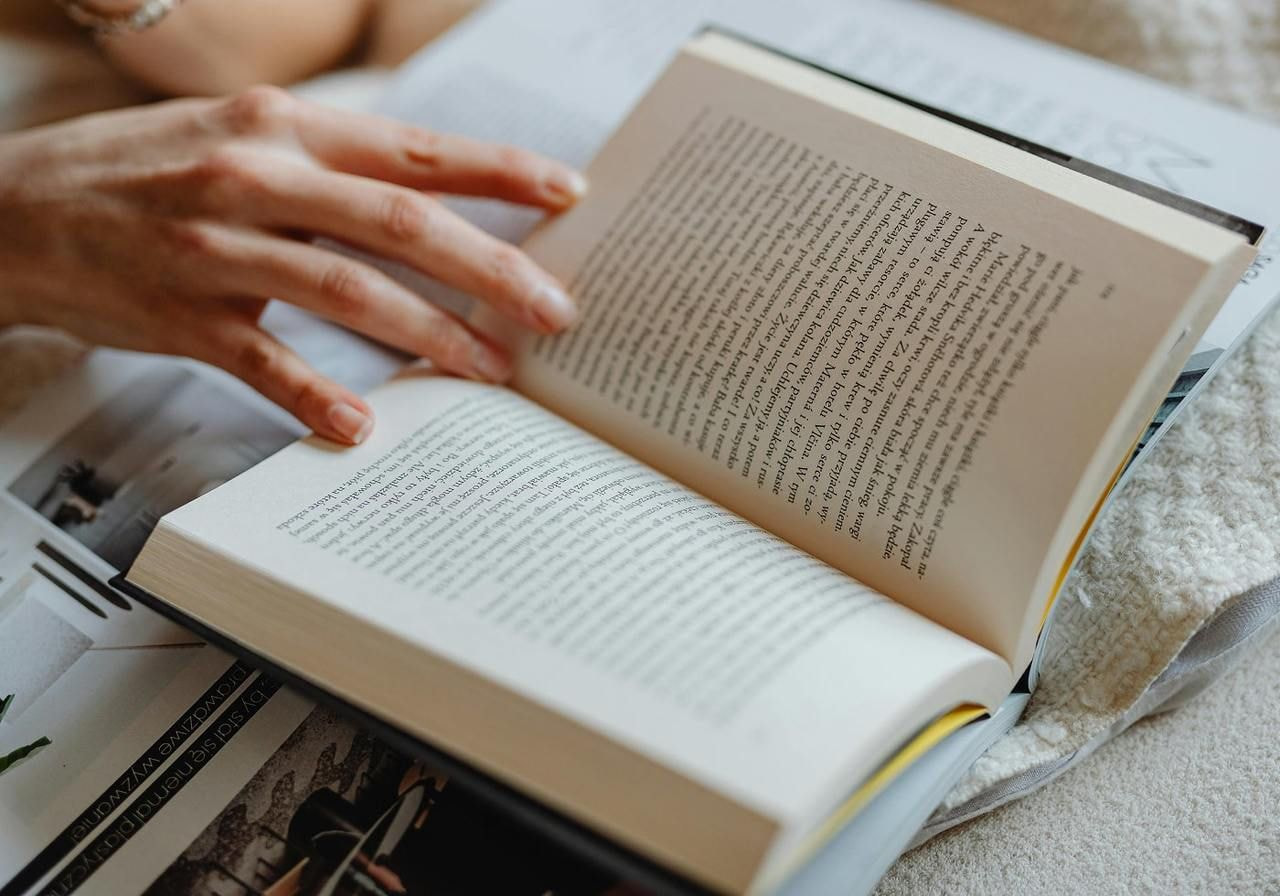 A Person reading a book.
