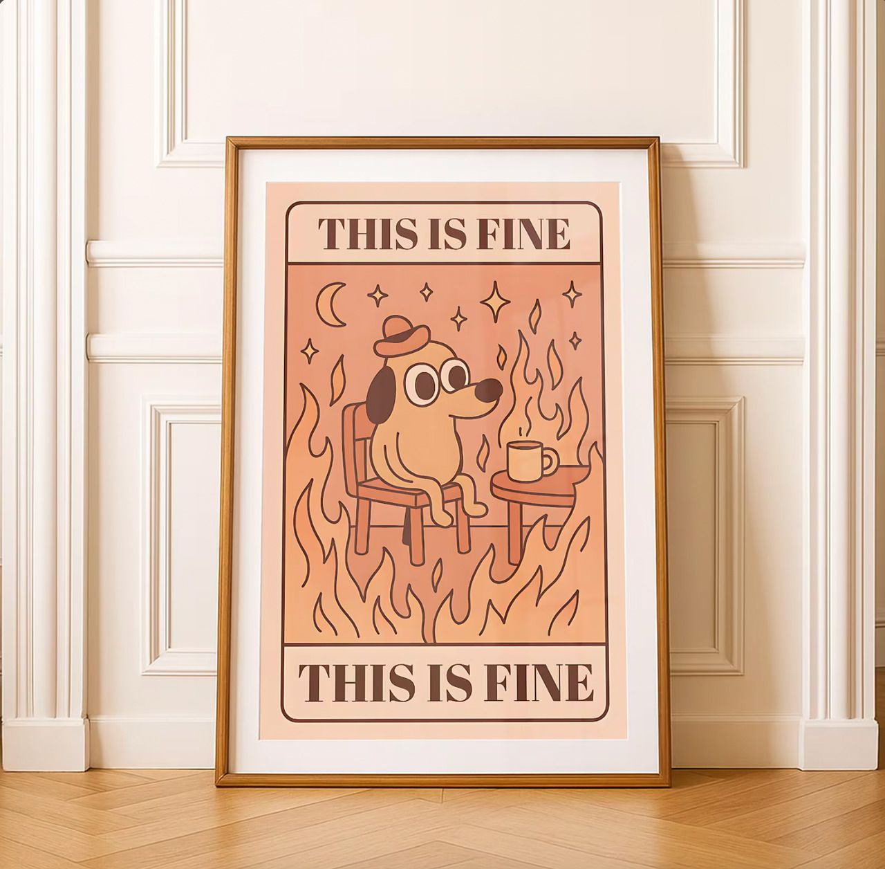 Framed pop culture characters wall art featuring the iconic "This is Fine" cartoon dog sitting at a table with a mug, surrounded by flames.