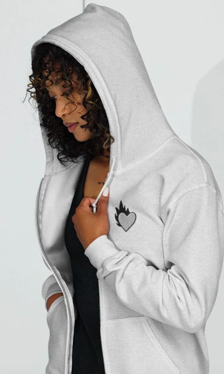 a woman in a white hoodie