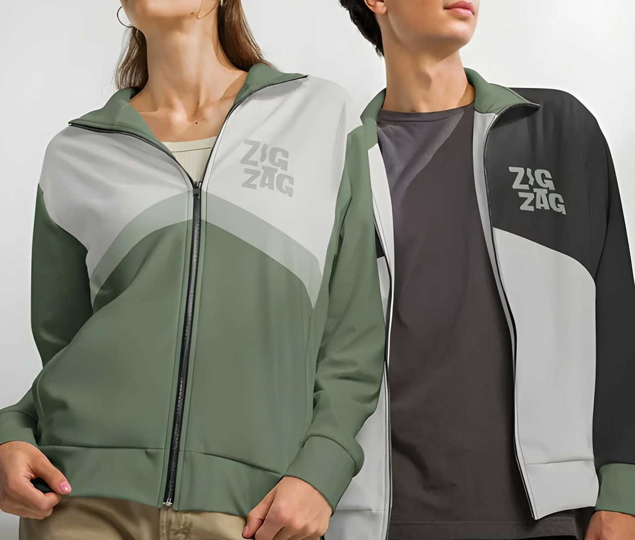 A man and a woman wearing zip-up jackets featuring a color-block design in various shades, with the text "ZIG ZAG" printed.