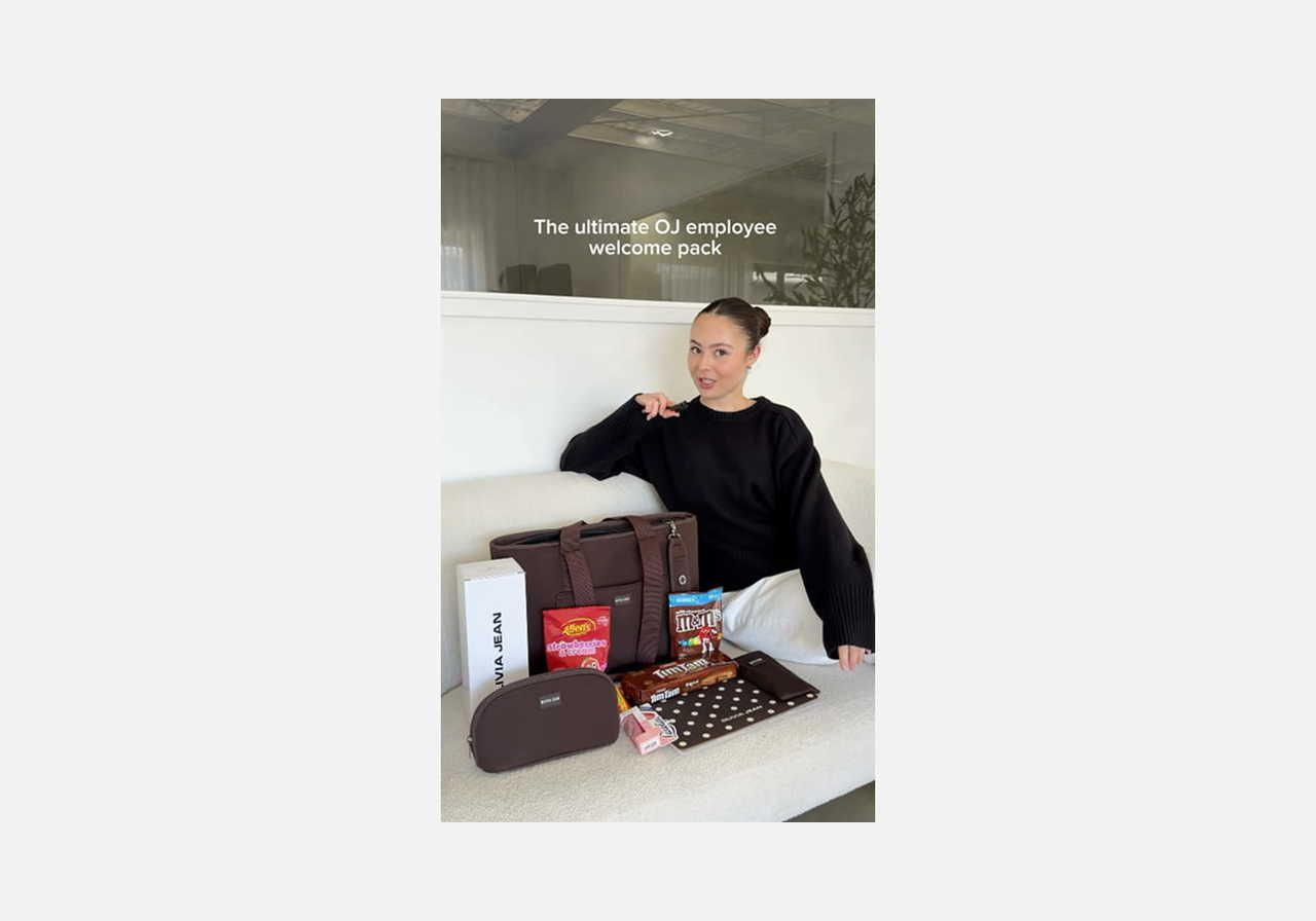 A screenshot mockup showing Olivia Jean’s employee welcome kit.