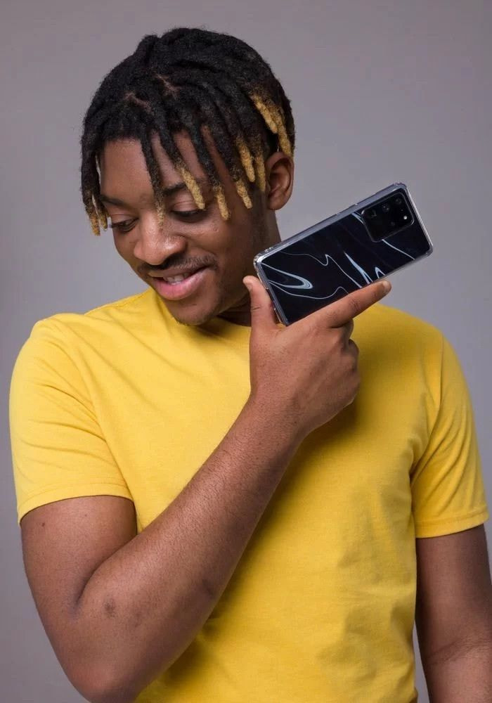 boy holding a personalized phone case