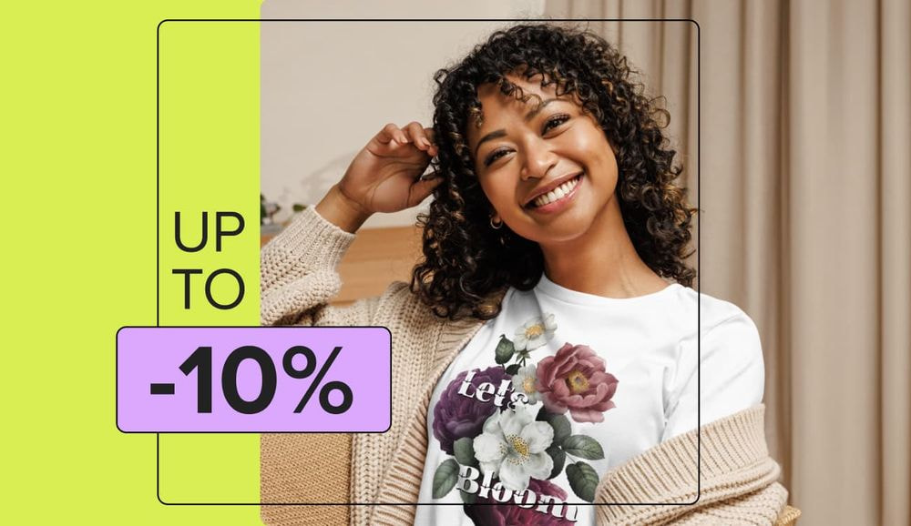 a woman smiling with curly hair