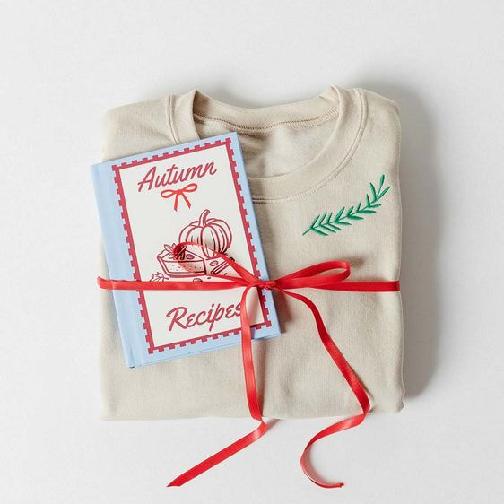 a shirt tied with a red ribbon