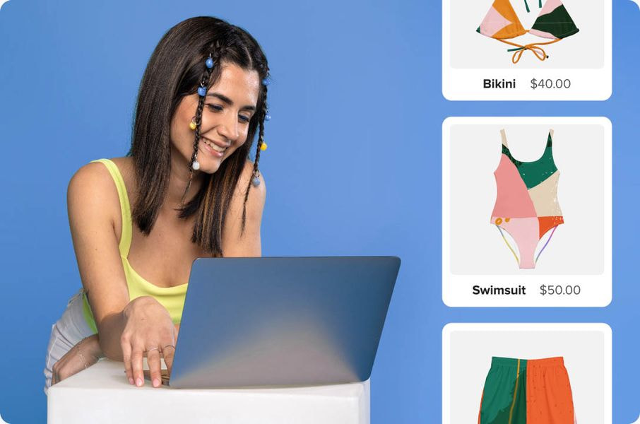 Entrepreneur using a laptop to build and manage a custom swimwear brand with product listings displayed alongside.