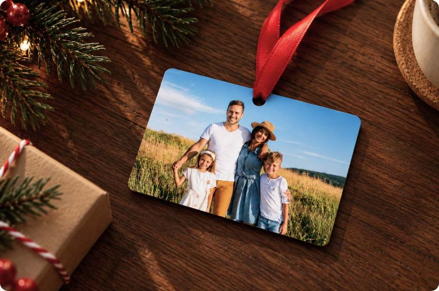 a photo of a family on a red ribbon