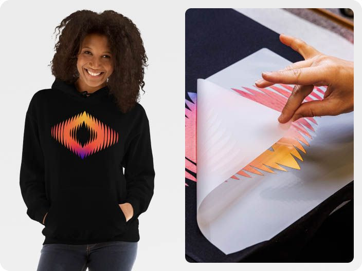 a woman wearing a black sweatshirt with a graphic design on it