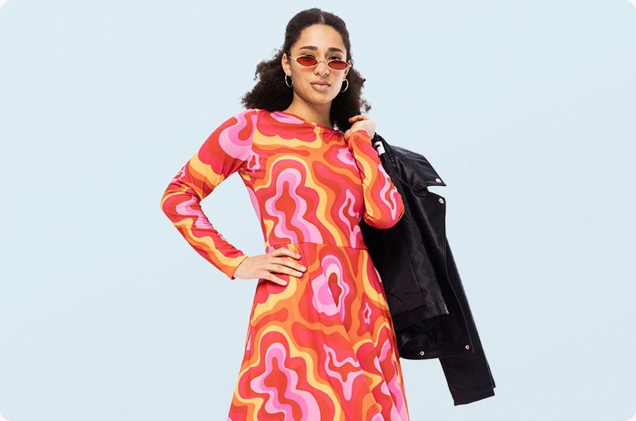 a woman in a colorful dress