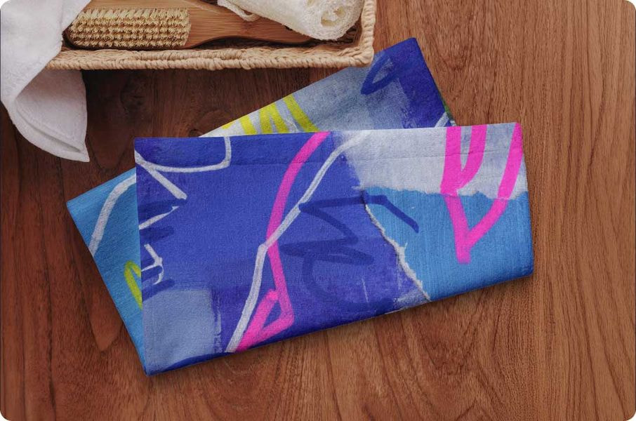 a blue towel on a wood surface