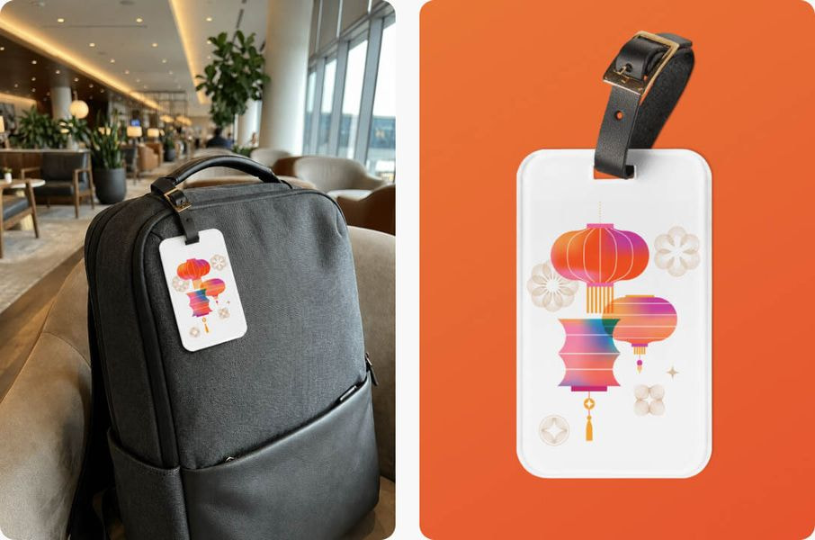 Personalized luggage tag attached to a backpack in an airport lounge, featuring a colorful lantern design printed on a custom travel accessory.
