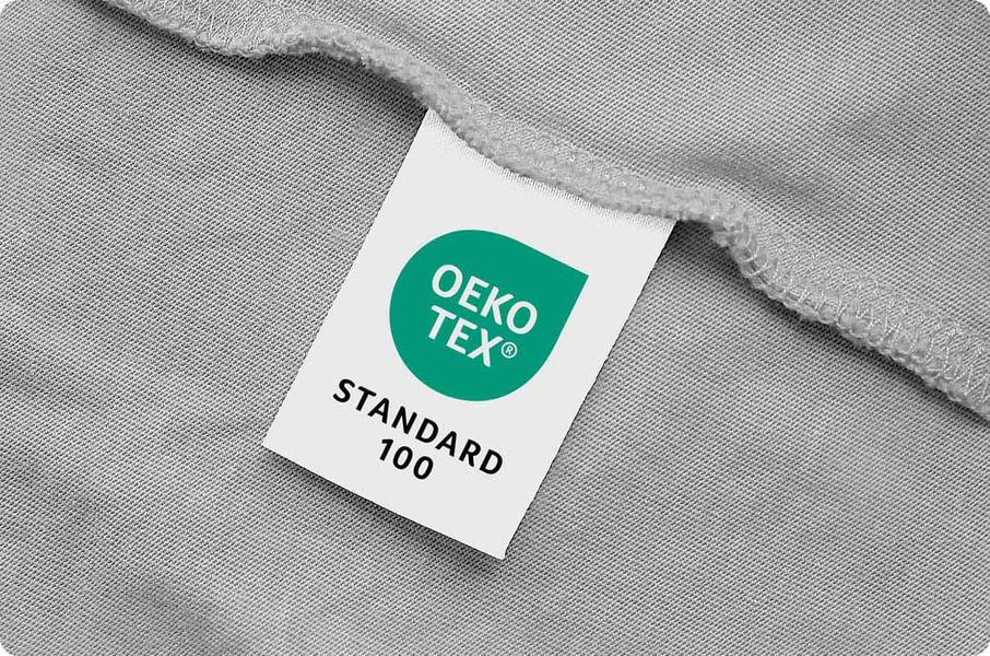 a white label on a gray fabric