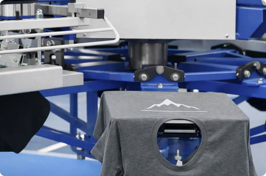 grey t-shirt on printing machine