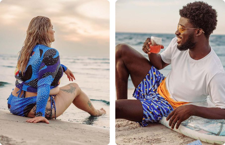 Beach lifestyle scene featuring coordinated custom swimwear, with a woman wearing a patterned long-sleeve swimsuit and a man wearing matching printed swim shorts.