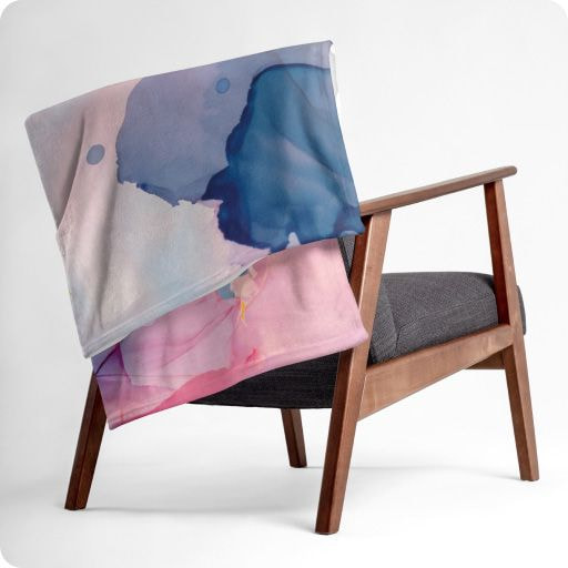 a chair with a blanket on it