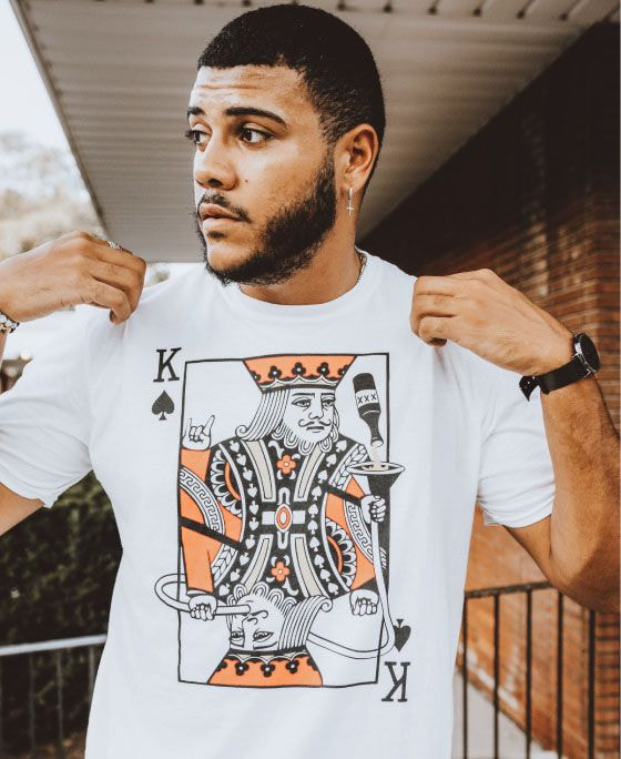 man wearing a card print t-shirt