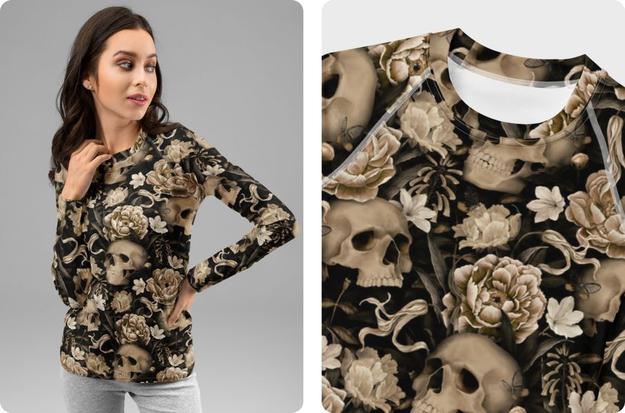 Long-sleeve rash guard covered in an intricate all-over pattern of skulls, flowers, and botanical elements, shown on a model with a detailed close-up of the print.