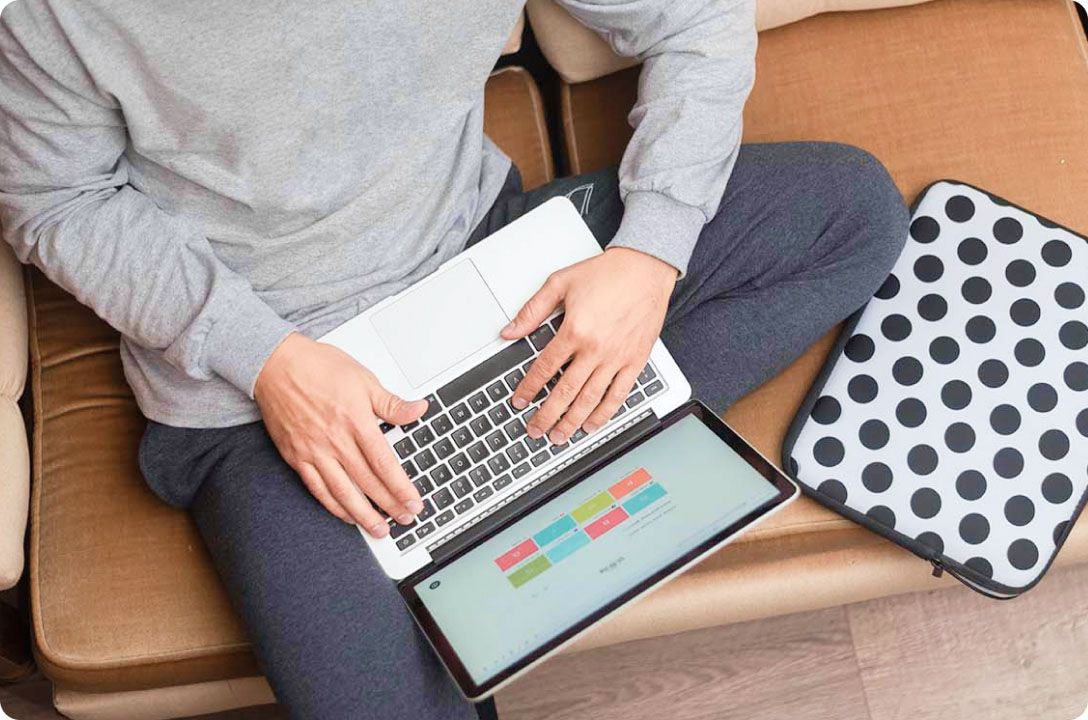 laptop on man's knees 