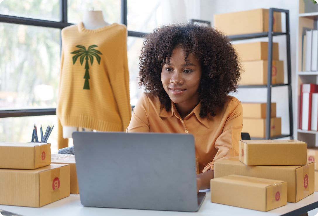 woman looking at laptop