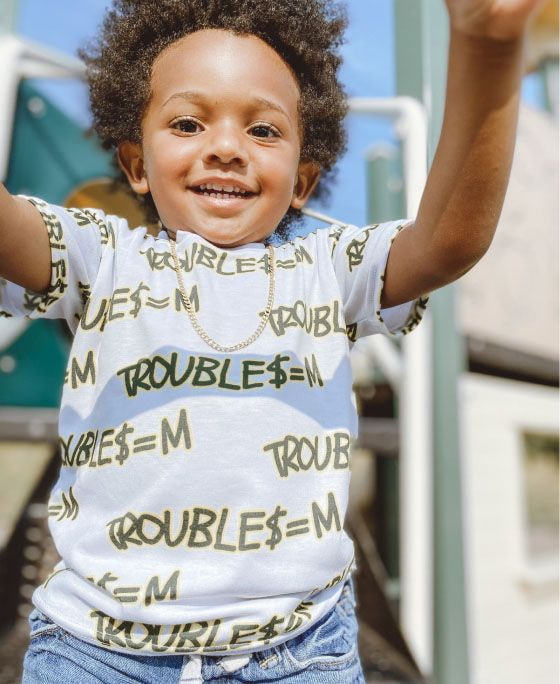 woman with curly hair wearing custom-printed t-shirt