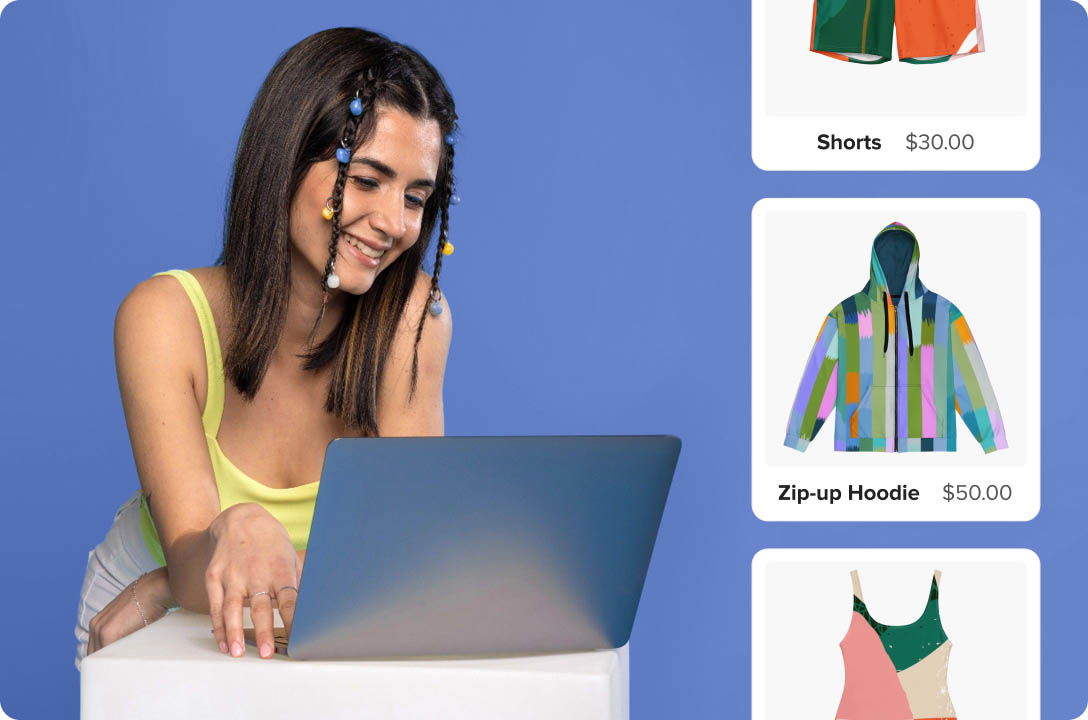 a woman sitting at a laptop